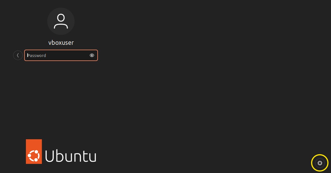 Screenshot of login screen showing gear icon in bottom-right corner